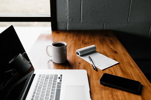 laptop, cup, notes
